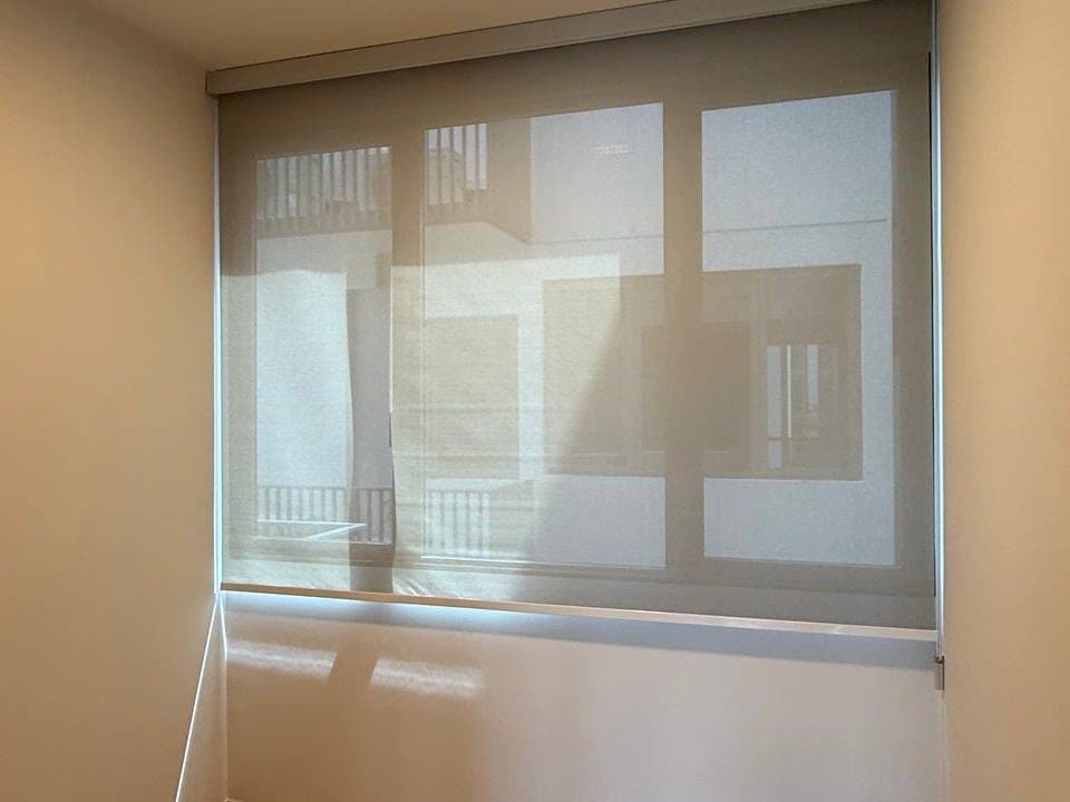 Roller blind half drawn